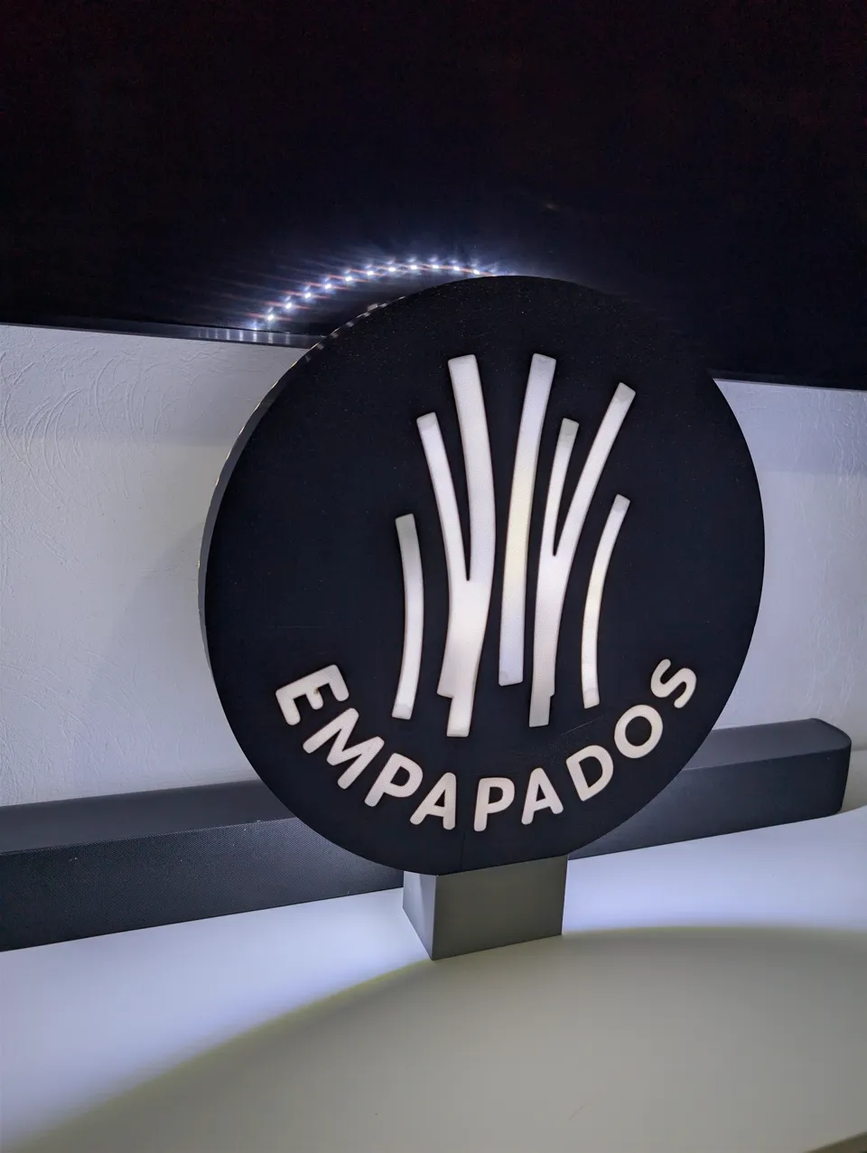 Letrero Empapados · fotografía real 2